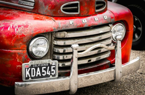 A vintage Ford truck in disrepair. Photo by David S from Unsplash
