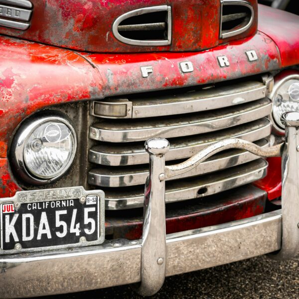 A vintage Ford truck in disrepair. Photo by David S from Unsplash