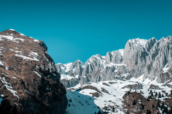 mountains with snow and a clear sky