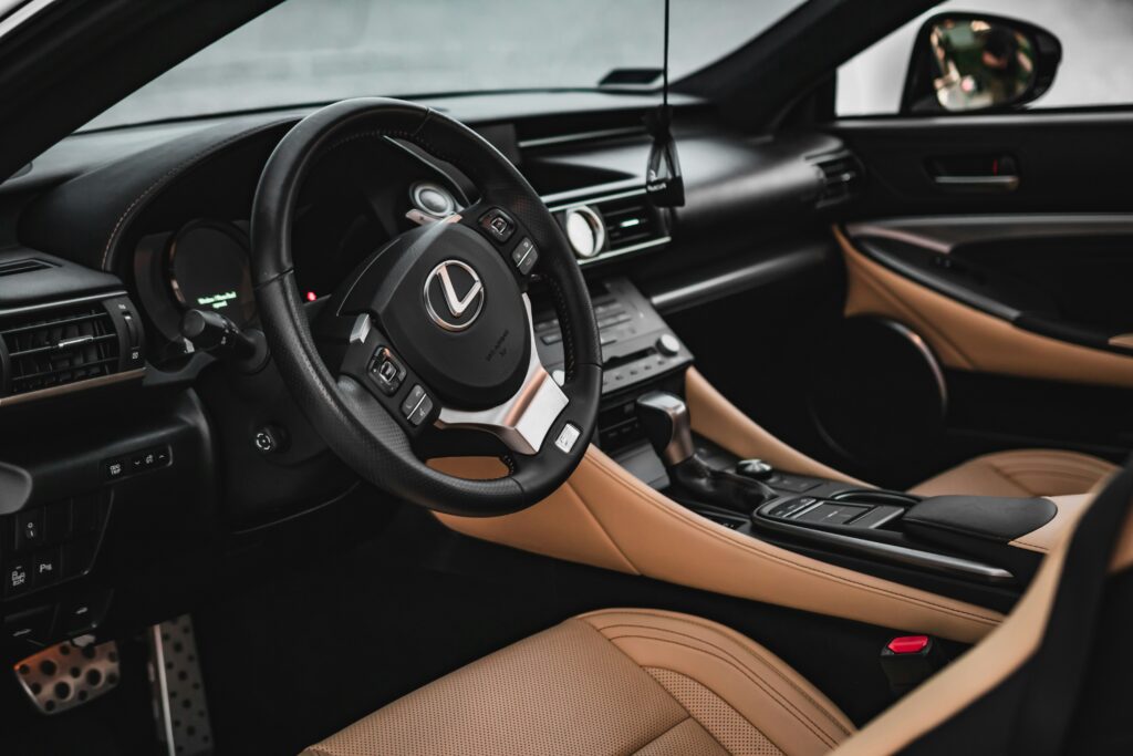 Lexus car with black and tan interior
Photo by Lukasz Niescioruk from Unsplash