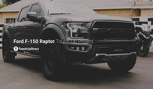 A photo of black Ford-F Raptor parked in an outdoor setting
