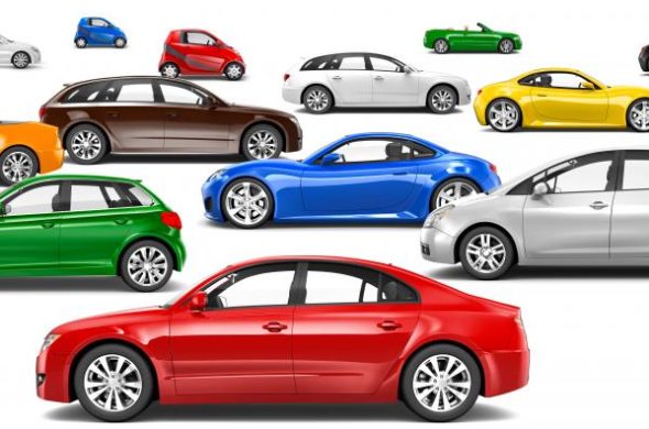 A lineup of automobiles in various eye-catching colors, showcasing a vibrant and diverse range of shades