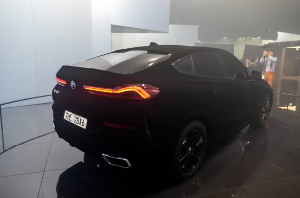 Black mercedes inside a showroom